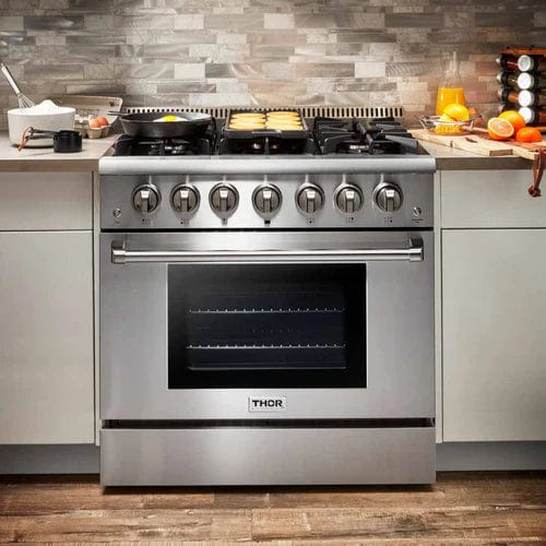 Thor Kitchen 4-Piece Pro Appliance Package - 36-Inch Dual Fuel Range, Refrigerator with Water Dispenser, Dishwasher, & Microwave Drawer in Stainless Steel I Luxury Appliances Direct