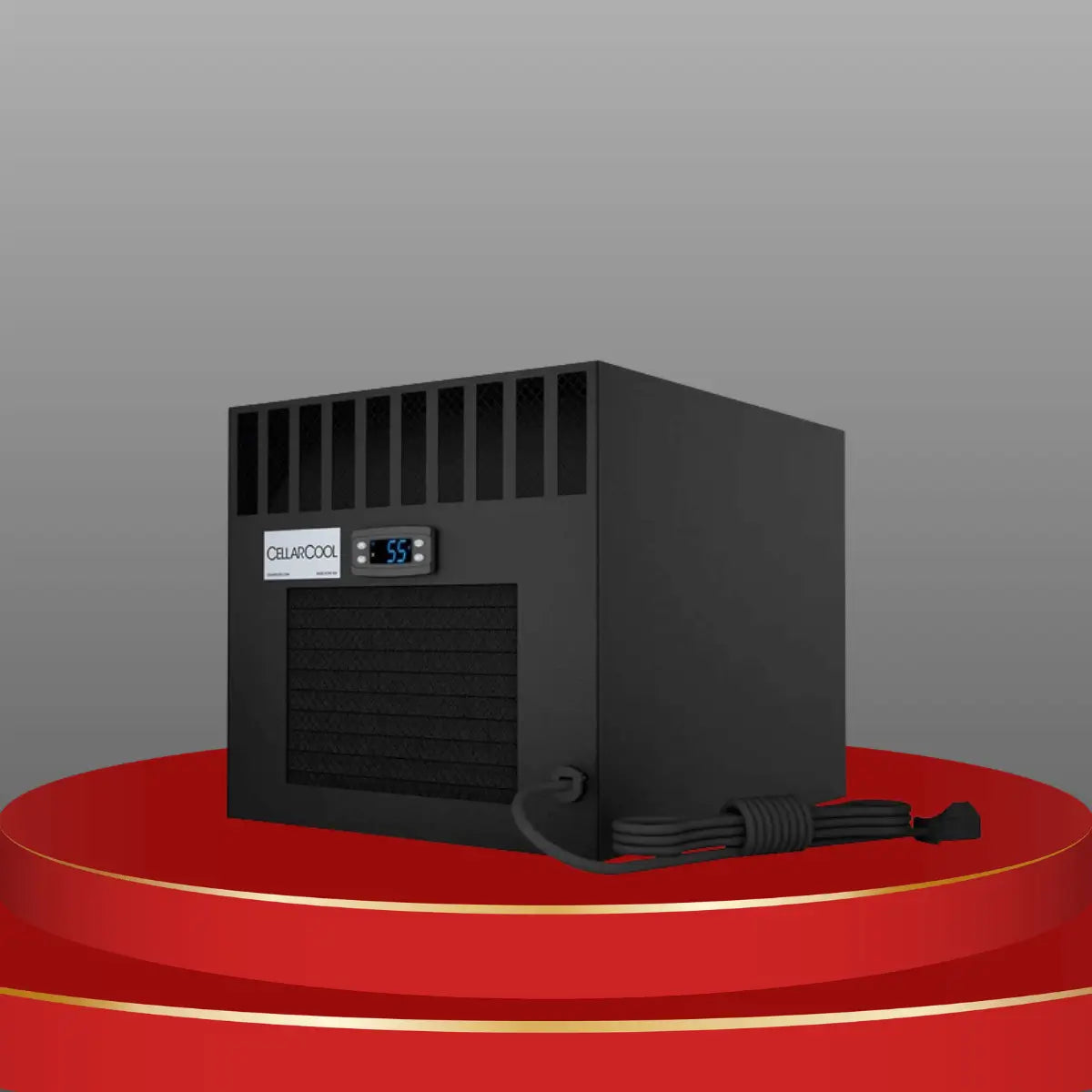 CellarCool through-the-wall wine cooling unit with digital temperature display and front ventilation grille on red display podium