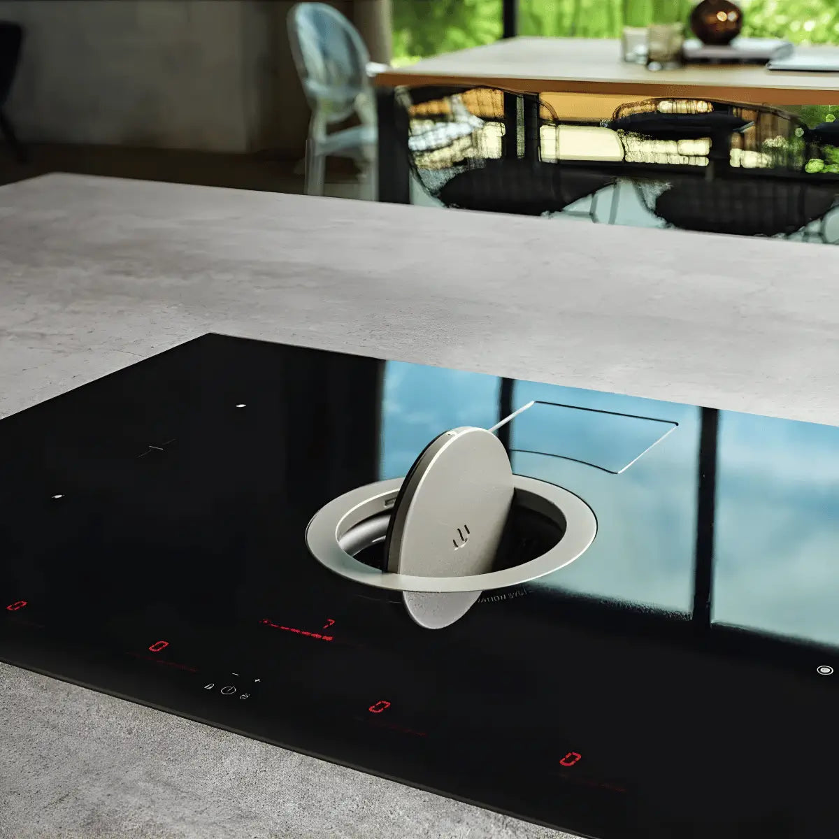 Elica induction cooktop with integrated downdraft ventilation system, featuring sleek black glass surface, touch controls, and modern kitchen island installation.