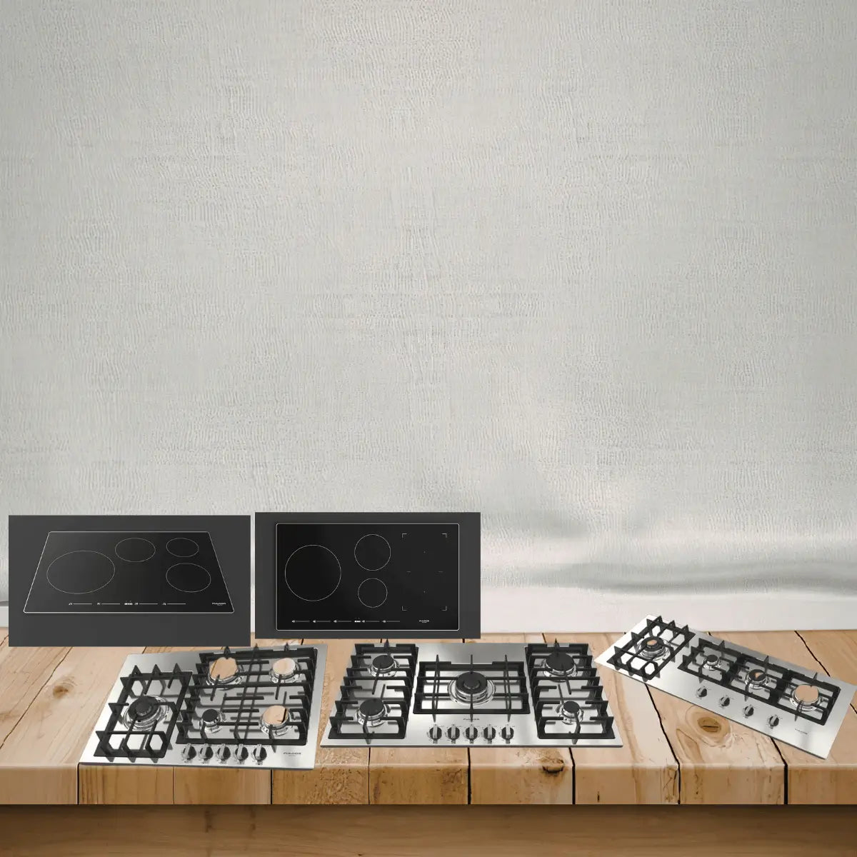 Fulgor Milano cooktops collection featuring stainless steel gas cooktops with cast iron grates and black glass electric and induction cooktops for modern kitchens