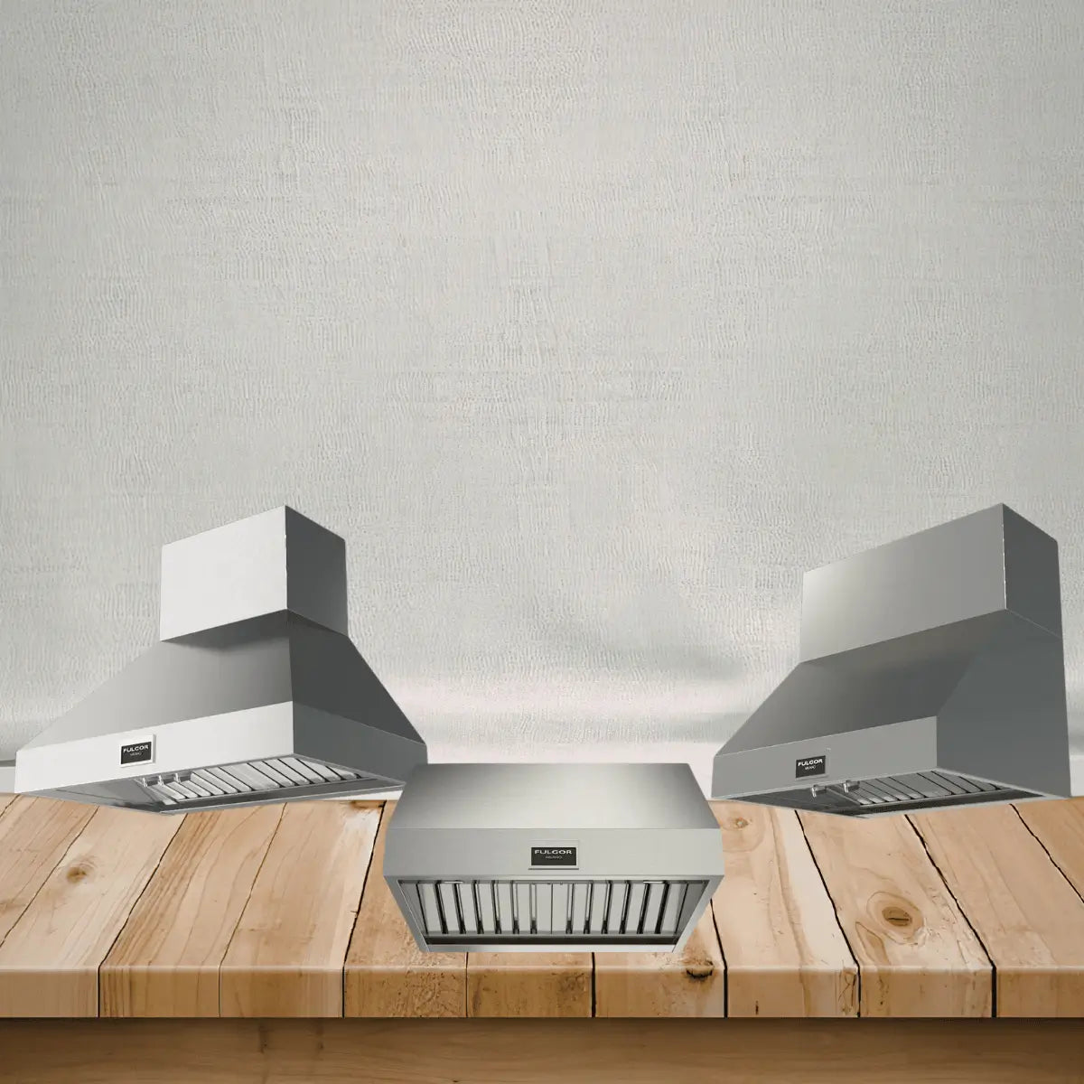 Fulgor Milano range hoods collection featuring stainless steel wall mount chimney hoods and built-in under cabinet kitchen ventilation hoods