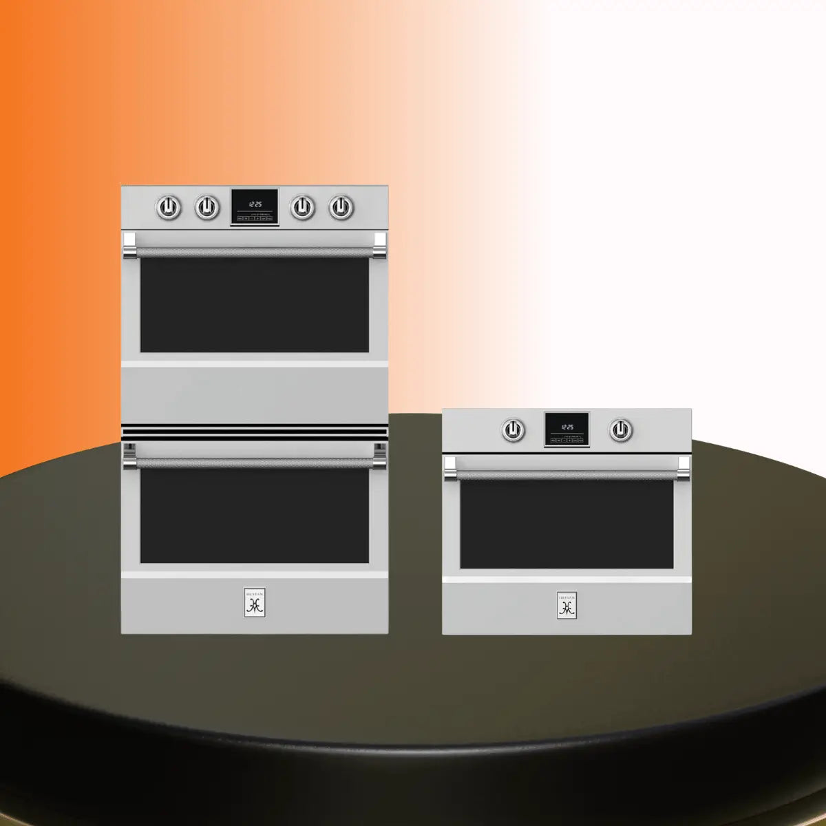Hestan ovens collection featuring stainless steel single and double wall ovens with digital displays and professional control knobs