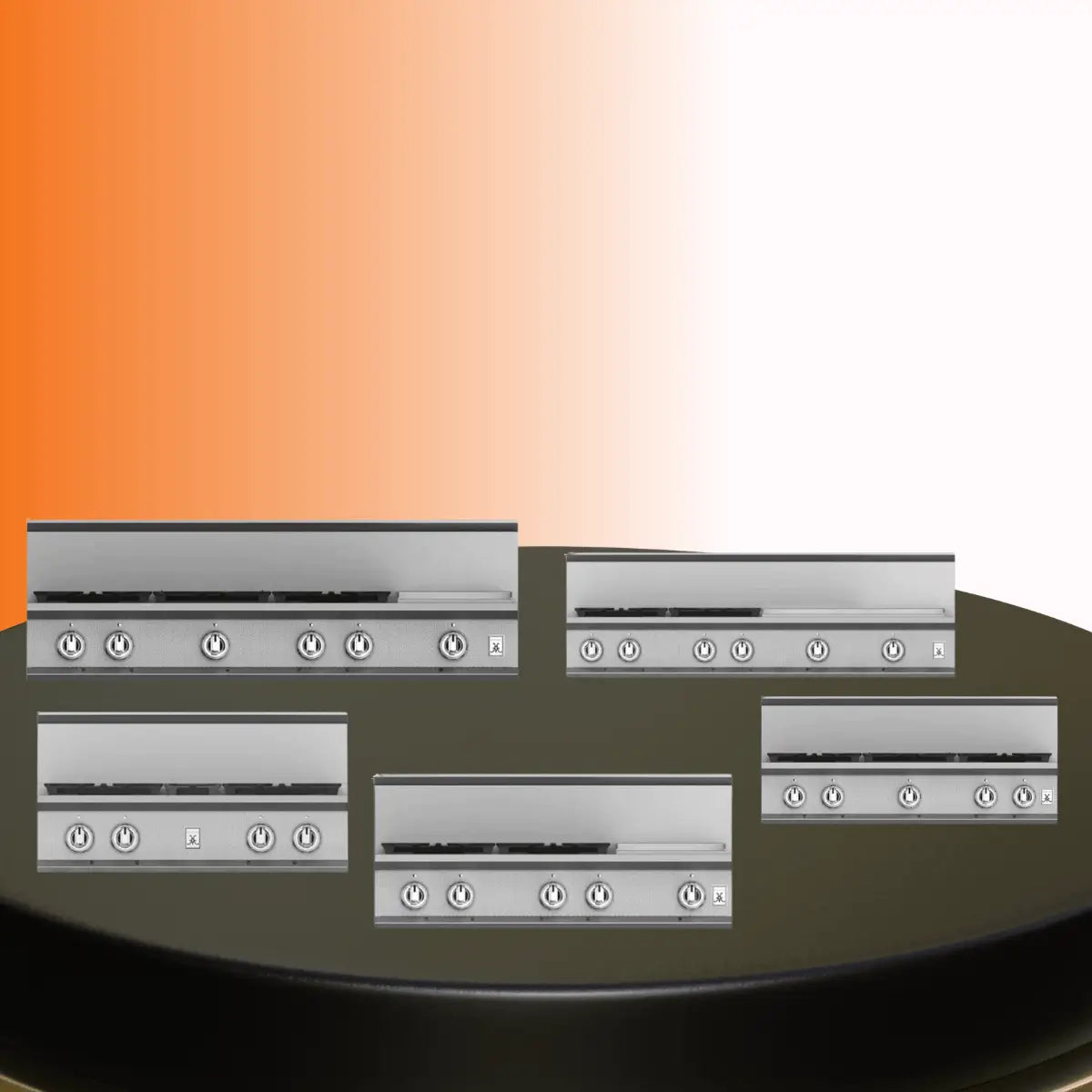 Hestan rangetops collection featuring professional stainless steel gas rangetops with multiple burners and front control knobs displayed on a platform