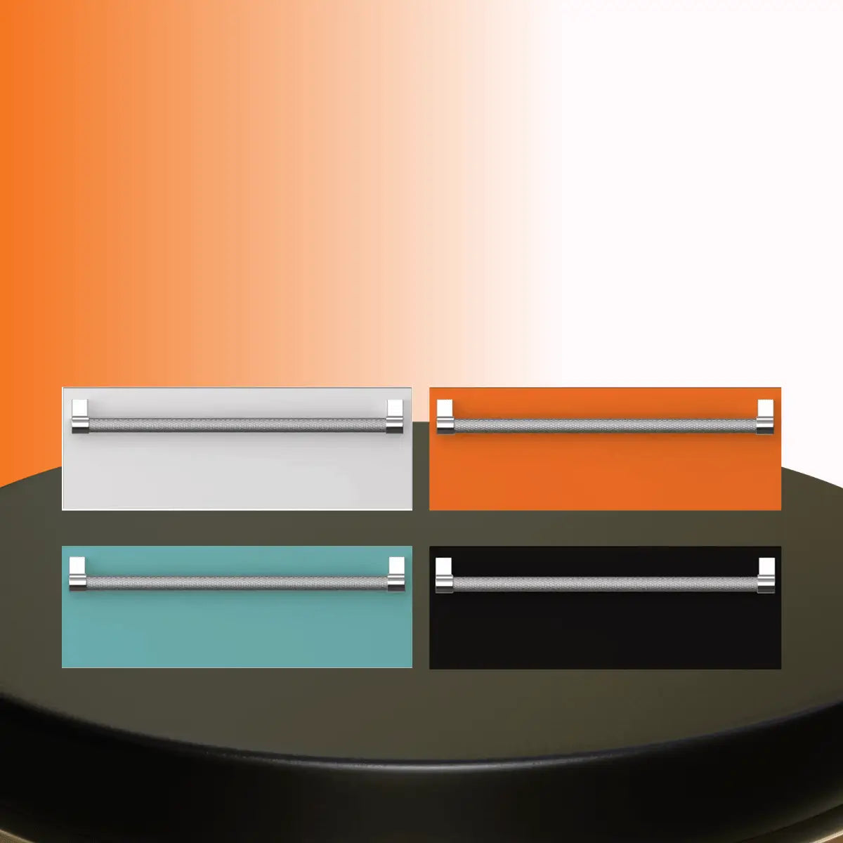 Hestan warming drawers collection featuring modern kitchen warming drawers in stainless steel, orange, teal, and black finishes with metal handles