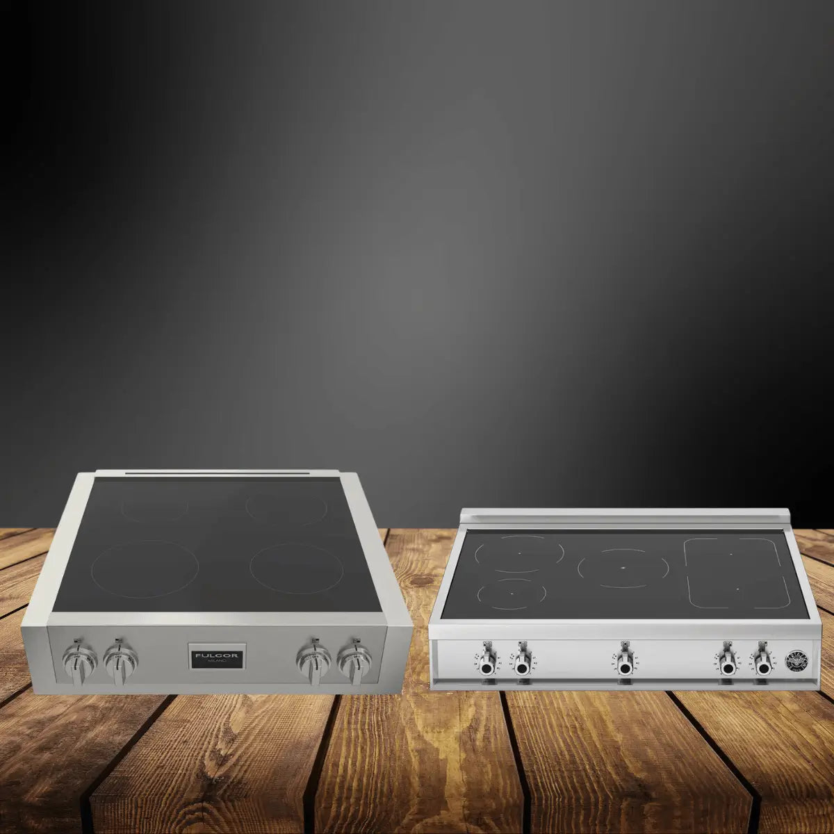 Induction rangetops collection featuring two stainless steel cooktops with smooth glass surfaces and front control knobs, displayed on a wooden countertop with a dark modern background.