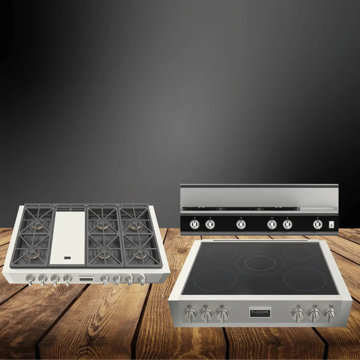 Propane rangetops collection featuring stainless steel gas cooktops with multiple burners, grates, and front control knobs, displayed on a wooden countertop with a dark modern background.