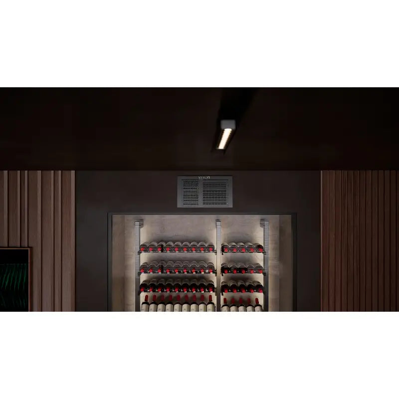 Front ventilation grille of the Panthaire Wine-R WR2500 through-the-wall cooling system installed above a wine bottle display